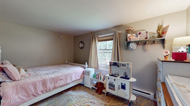 142 Myck Rd, Dingmans Ferry, PA 18328 - bedroom featuring baseboard heating and wood finished floors