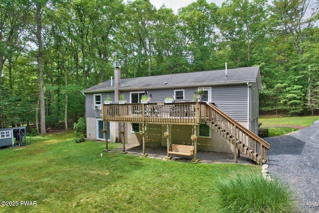 142 Myck Rd, Dingmans Ferry, PA 18328 - back of house with a deck, a lawn, stairs, a chimney, and a shingled roof
