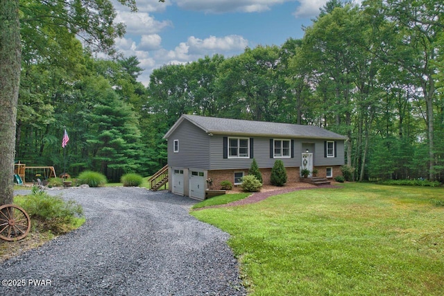142 Myck Rd, Dingmans Ferry, PA 18328 - bi-level home featuring an attached garage, gravel driveway, a front yard, and brick siding