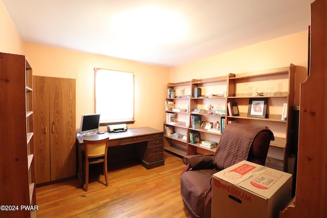 home office with light wood-type flooring