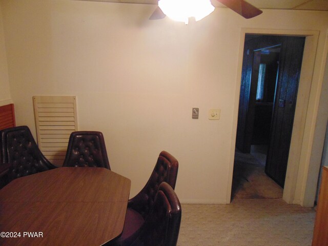 home office featuring carpet flooring and ceiling fan