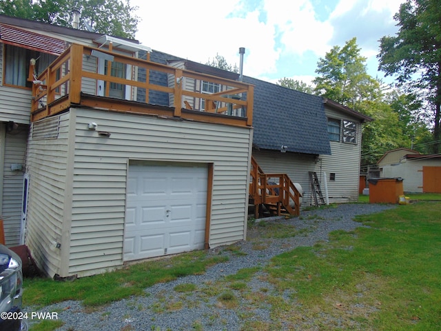 back of property with a balcony