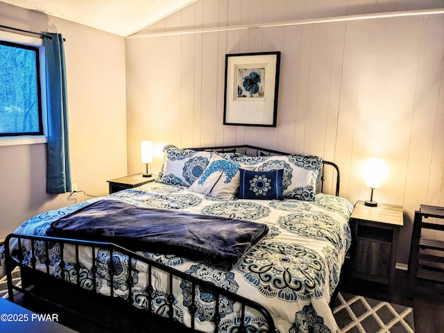 bedroom featuring lofted ceiling