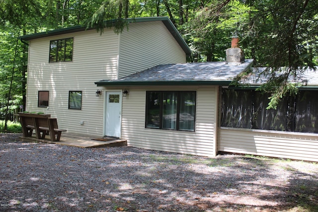 rear view of property featuring a patio