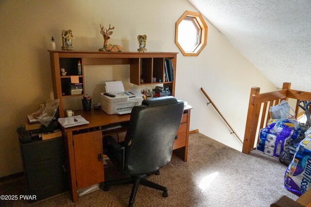home office featuring vaulted ceiling, a textured ceiling, and carpet floors