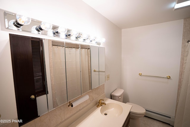 1111 Advent Rd, Lake Ariel, PA 18436 - full bath featuring a baseboard heating unit, toilet, vanity, and a shower with shower curtain