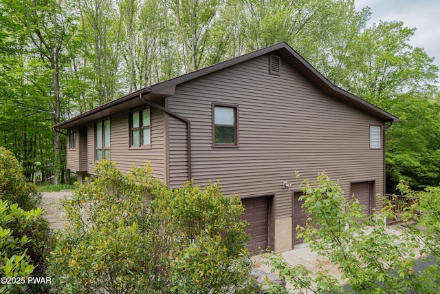 1111 Advent Rd, Lake Ariel, PA 18436 - view of home's exterior featuring a garage and concrete driveway