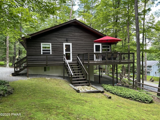 112 N Maple Ln, Greentown, PA 18426 - back of property featuring stairs, a wooden deck, and a yard