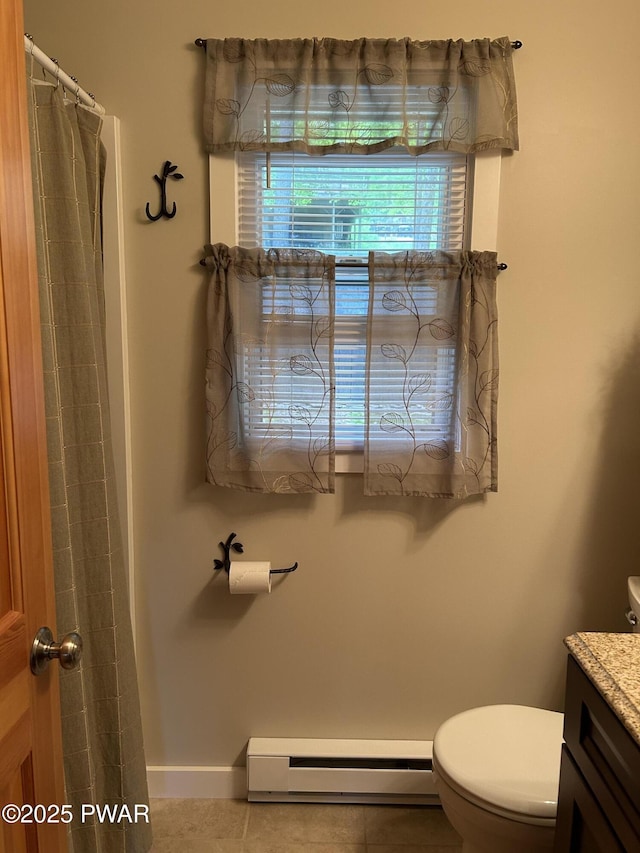 112 N Maple Ln, Greentown, PA 18426 - bathroom with a baseboard heating unit, vanity, tile patterned flooring, and a shower with curtain