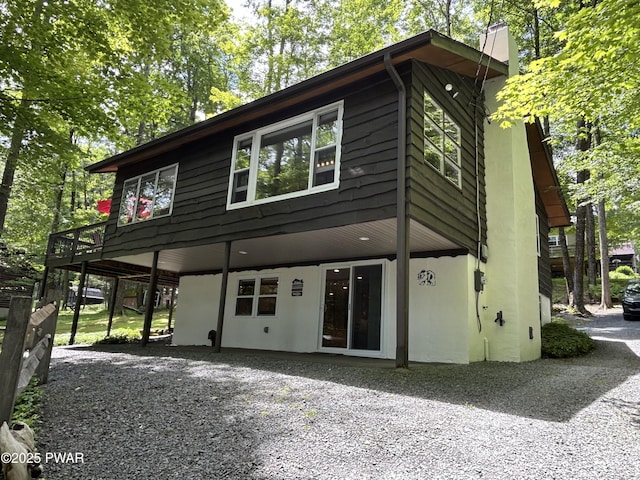 112 N Maple Ln, Greentown, PA 18426 - view of front of property featuring a wooden deck and gravel driveway