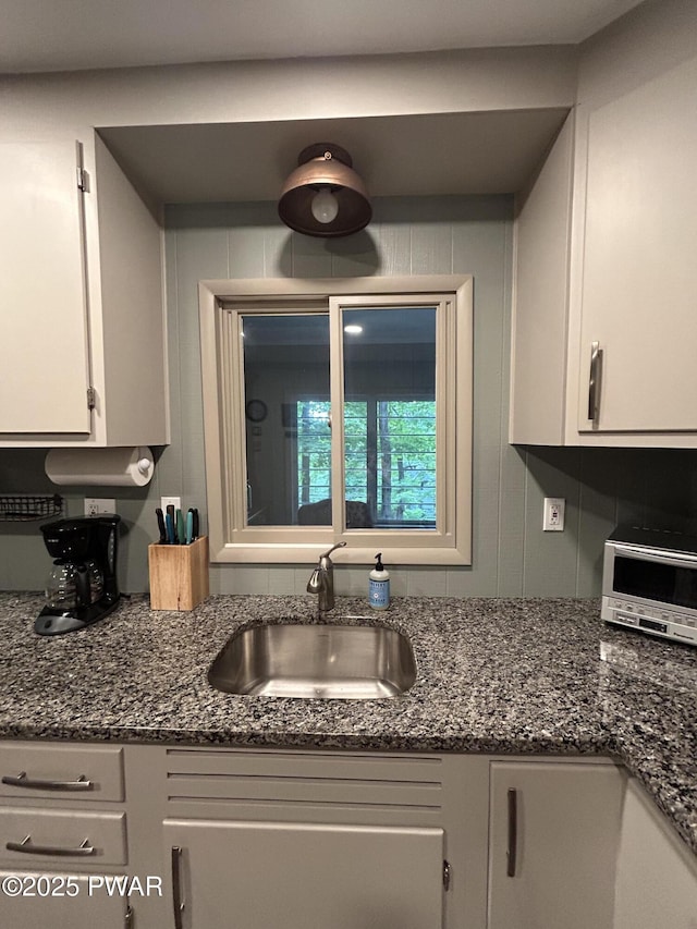 112 N Maple Ln, Greentown, PA 18426 - kitchen with white cabinets and dark stone countertops