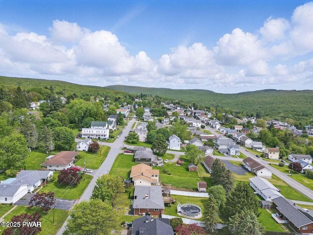 132 Dundaff St, Forest City, PA 18421 - aerial view of residential area featuring a heavily wooded area