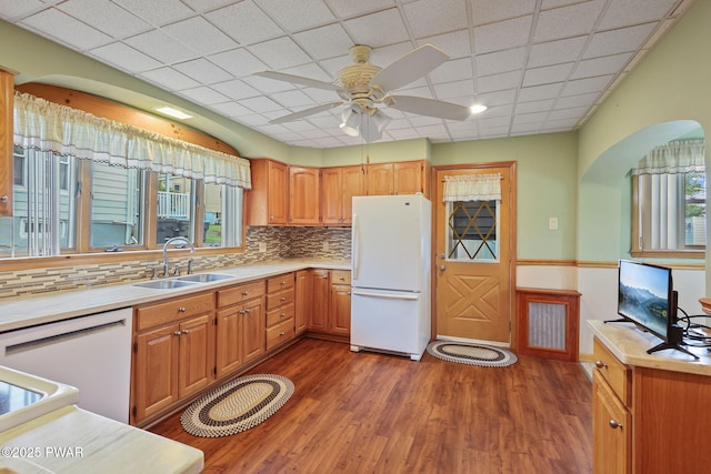 132 Dundaff St, Forest City, PA 18421 - kitchen featuring white appliances, a ceiling fan, dark wood-style floors, tasteful backsplash, and light countertops