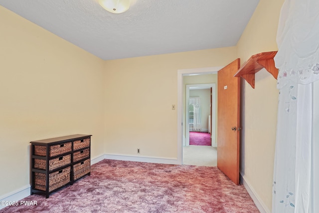 132 Dundaff St, Forest City, PA 18421 - unfurnished bedroom with carpet flooring and a textured ceiling