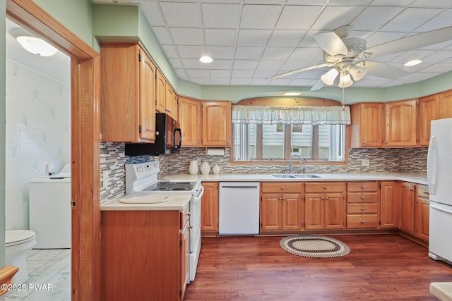 132 Dundaff St, Forest City, PA 18421 - kitchen featuring white appliances, washer / dryer, ceiling fan, light countertops, and dark wood-type flooring