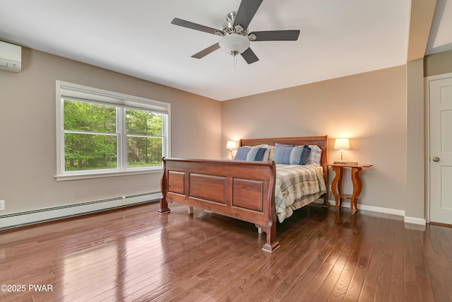 174 Lee Rd, Shohola, PA 18458 - bedroom featuring a baseboard radiator, wood-type flooring, baseboards, ceiling fan, and a wall unit AC
