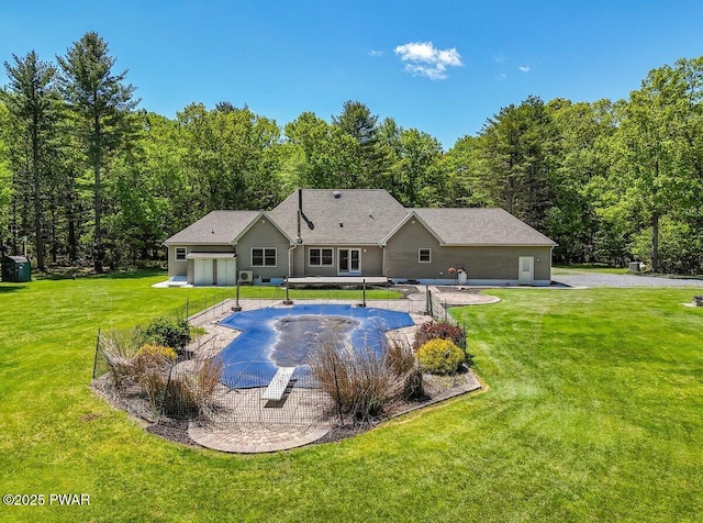 174 Lee Rd, Shohola, PA 18458 - view of swimming pool featuring a patio area, a yard, and a wooded view