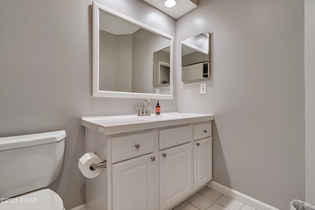 174 Lee Rd, Shohola, PA 18458 - half bath featuring toilet, baseboards, vanity, and tile patterned floors