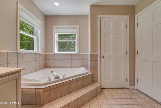 174 Lee Rd, Shohola, PA 18458 - bathroom with a garden tub, tile patterned floors, and vanity