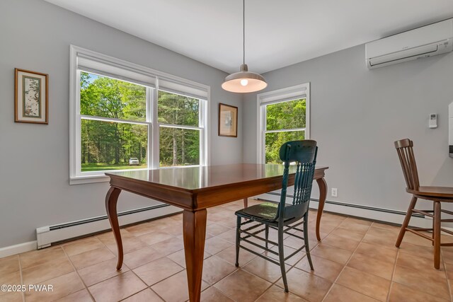 174 Lee Rd, Shohola, PA 18458 - dining area with baseboard heating, a wall unit AC, baseboards, and light tile patterned floors