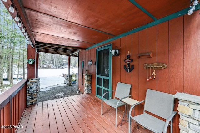 view of snow covered deck