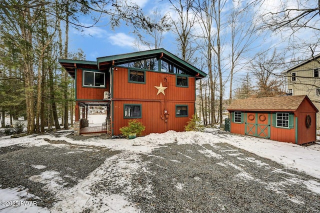 exterior space featuring a storage shed