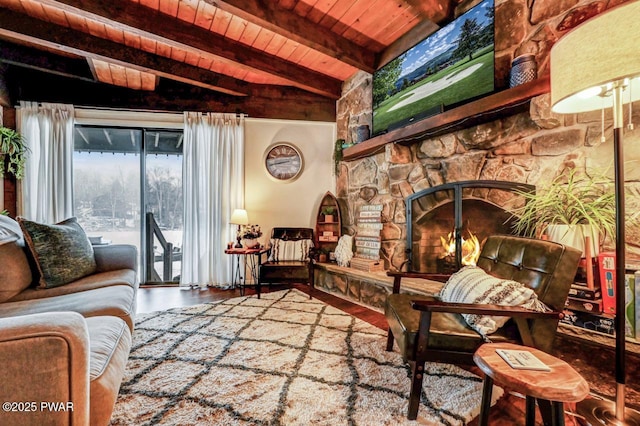 interior space with wood ceiling, wood-type flooring, a fireplace, and vaulted ceiling with beams