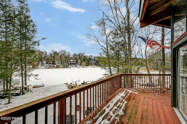 view of snow covered deck