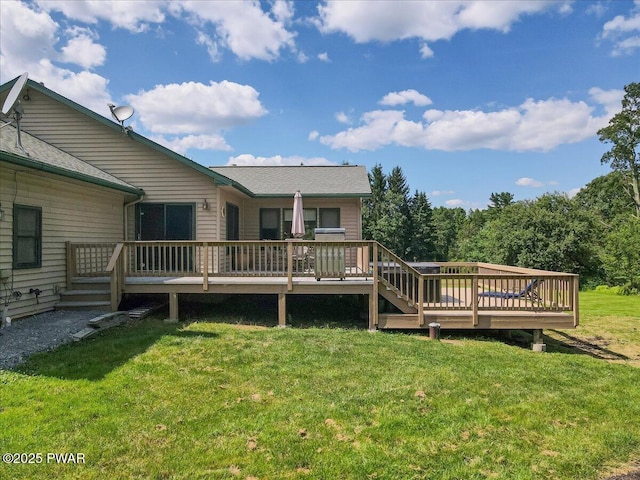 11 Coyote Rdg, Hawley, PA 18428 - back of house with a deck and a lawn