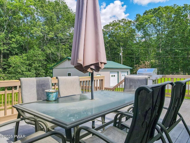 11 Coyote Rdg, Hawley, PA 18428 - wooden deck with outdoor dining space, an outbuilding, and area for grilling