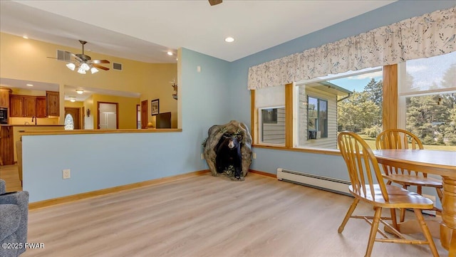 11 Coyote Rdg, Hawley, PA 18428 - dining room featuring light wood finished floors, baseboard heating, ceiling fan, and recessed lighting