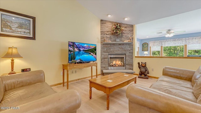 11 Coyote Rdg, Hawley, PA 18428 - living area featuring a fireplace, wood finished floors, and ceiling fan