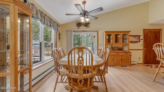 11 Coyote Rdg, Hawley, PA 18428 - dining area with lofted ceiling, ceiling fan, baseboard heating, and light wood finished floors