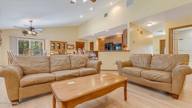 11 Coyote Rdg, Hawley, PA 18428 - living room with a ceiling fan, vaulted ceiling, and light wood-style floors