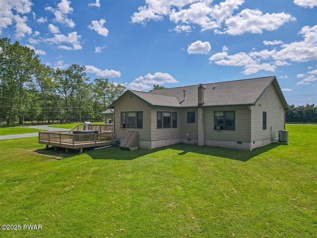11 Coyote Rdg, Hawley, PA 18428 - rear view of house with crawl space, a deck, and a yard