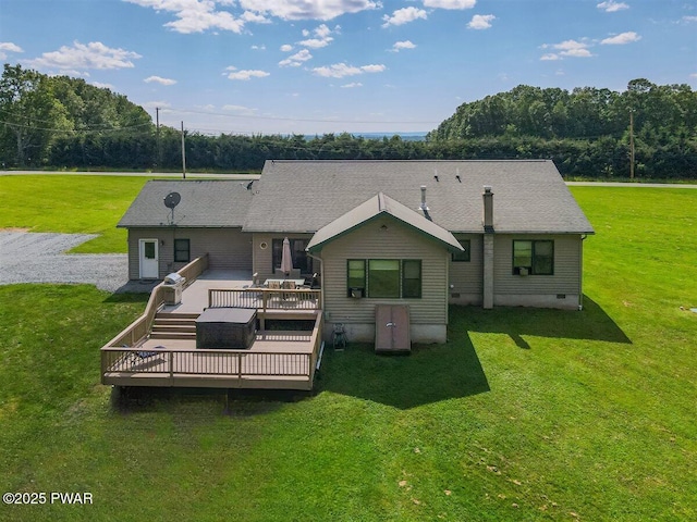 11 Coyote Rdg, Hawley, PA 18428 - rear view of house featuring a deck and a lawn