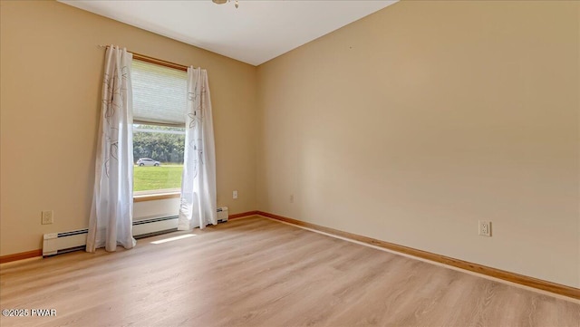 11 Coyote Rdg, Hawley, PA 18428 - unfurnished room featuring light wood finished floors and baseboard heating