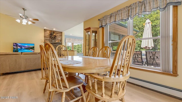 11 Coyote Rdg, Hawley, PA 18428 - dining space with a baseboard radiator, wood finished floors, and ceiling fan