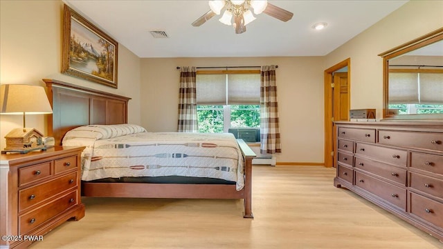 11 Coyote Rdg, Hawley, PA 18428 - bedroom with a baseboard heating unit, light wood-style flooring, a ceiling fan, and recessed lighting