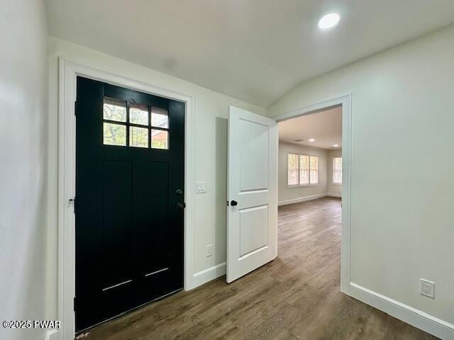 404 Forest Dr, Lords Valley, PA 18428 - entrance foyer featuring baseboards, dark wood-type flooring, lofted ceiling, and recessed lighting
