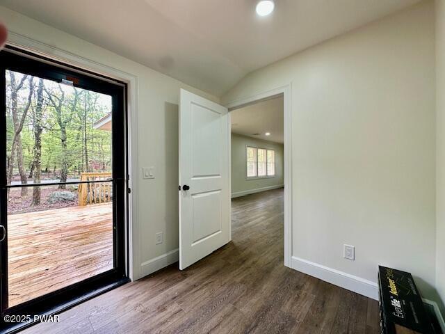404 Forest Dr, Lords Valley, PA 18428 - doorway to outside featuring baseboards, dark wood-type flooring, lofted ceiling, and recessed lighting