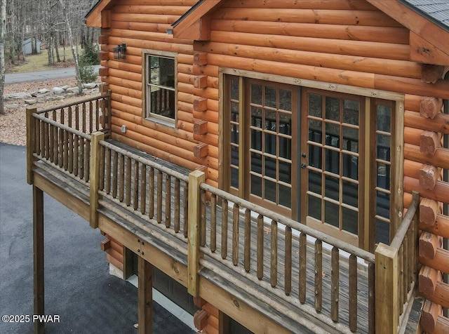 wooden deck featuring french doors