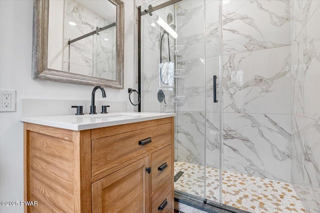 bathroom with vanity and walk in shower