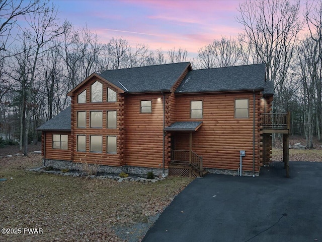 view of log cabin