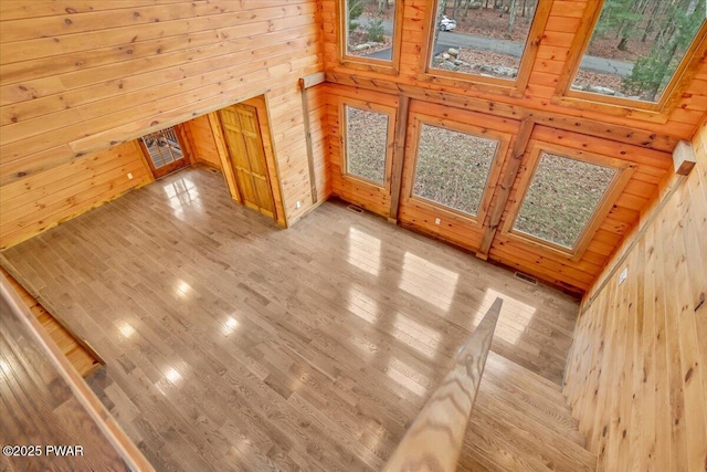 bonus room with wood walls