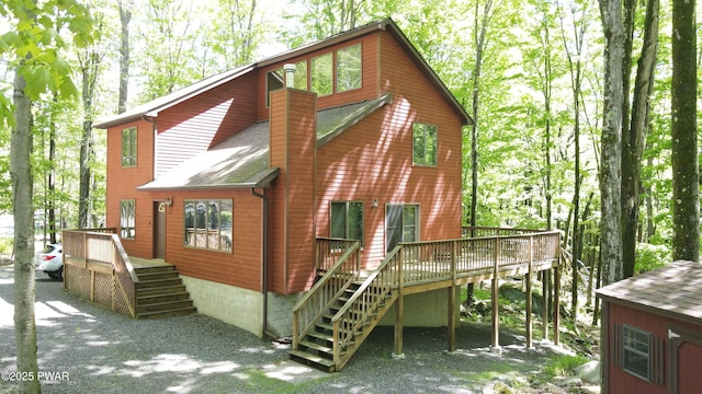 726 Wildwood Ter, Lake Ariel, PA 18436 - rear view of property featuring stairs, a deck, and roof with shingles