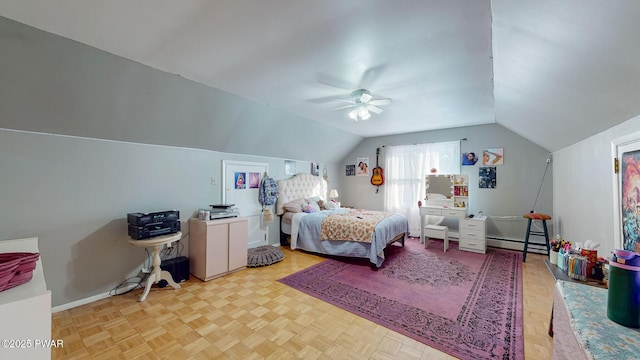 bedroom with a baseboard radiator, vaulted ceiling, baseboards, and ceiling fan