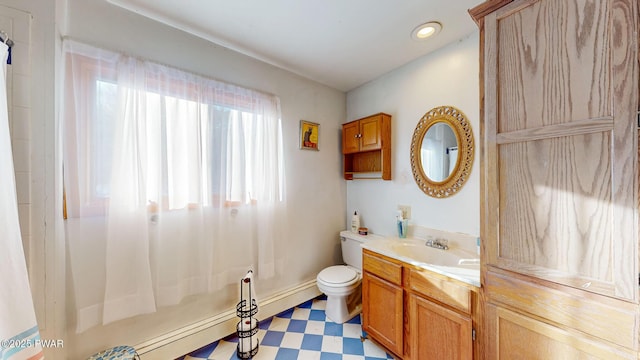 bathroom with recessed lighting, vanity, toilet, and tile patterned floors