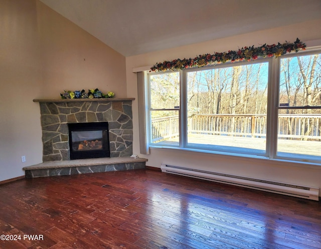 unfurnished living room with a baseboard radiator, vaulted ceiling, dark hardwood / wood-style floors, and a stone fireplace