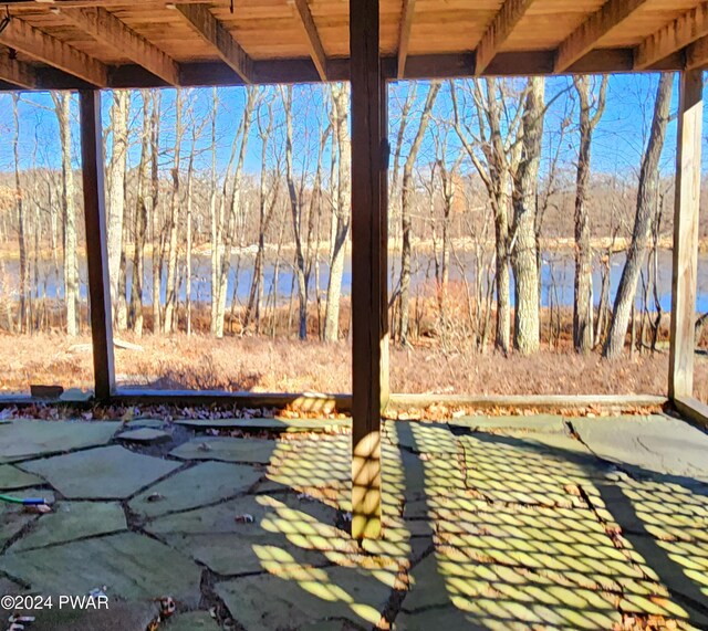 view of patio / terrace with a water view